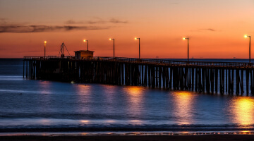 View of sun setting at Pismo Beach pier